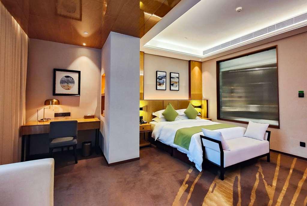 Leshan Ramada Hotel Zimmer foto
