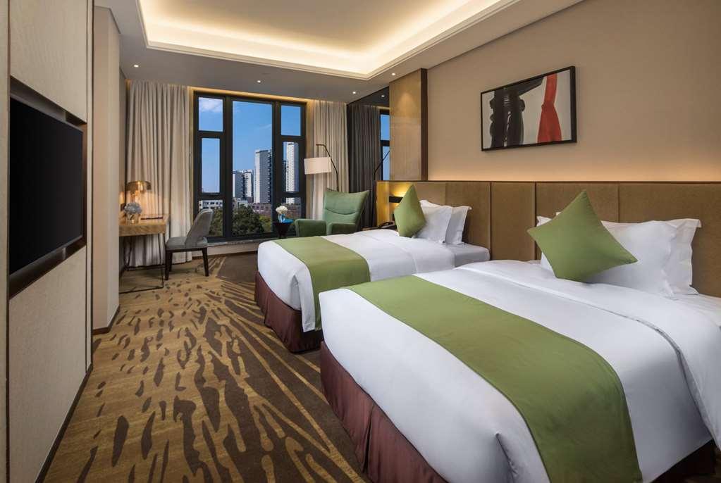 Leshan Ramada Hotel Zimmer foto
