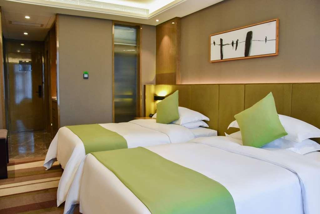 Leshan Ramada Hotel Zimmer foto