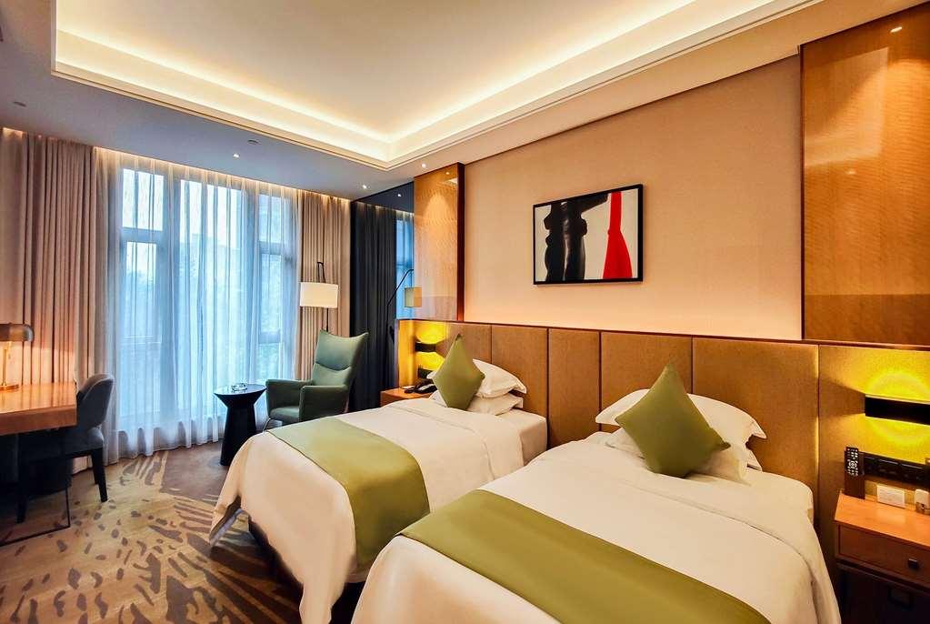 Leshan Ramada Hotel Zimmer foto