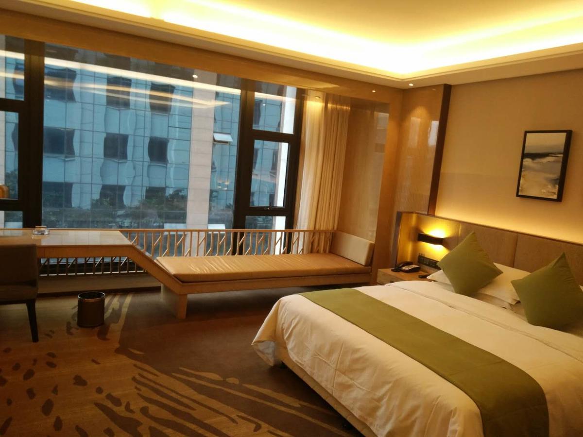 Leshan Ramada Hotel Zimmer foto